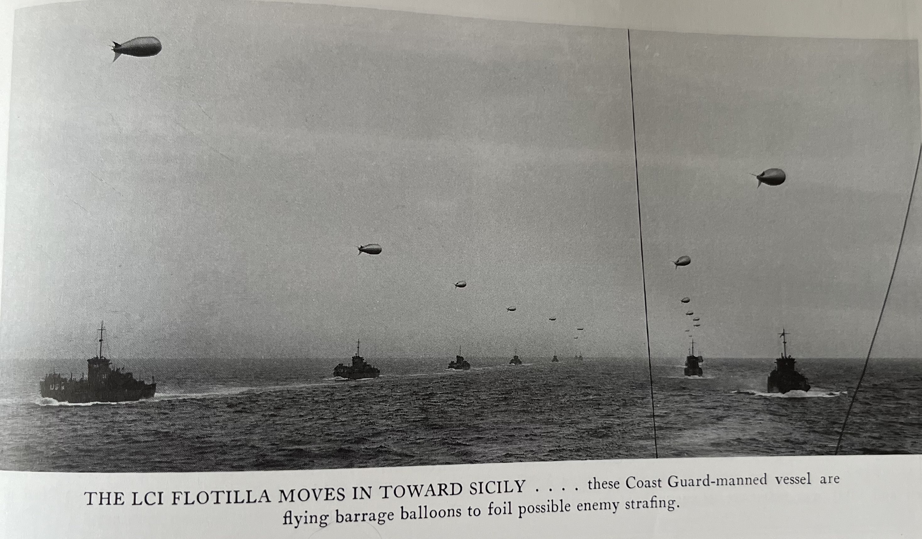 Photograph of a flotilla of USCG-manned LCIs steaming toward Sicily. These Coast Guard LCIs are flying barrage balloons to foil enemy strafing attacks. (U.S. Coast Guard) Photograph of a flotilla of USCG-manned LCIs steaming toward Sicily. These Coast Guard LCIs are flying barrage balloons to foil enemy strafing attacks. (U.S. Coast Guard)